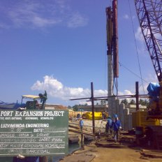 PSC Pile Driving using Hydraulic Impact Hammer on Barge Crane